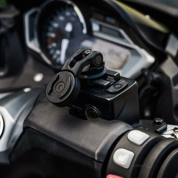 Smartphone mounting on brake fluid reservoir